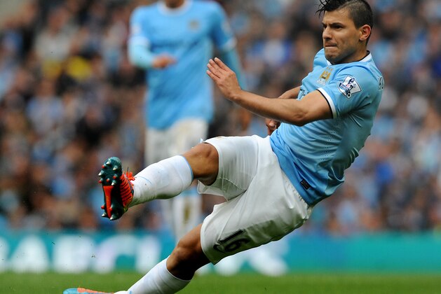 Manchester City's Sergio Aguero during the English Premier League soccer match between Manchester City and West Ham United at the Etihad Stadium,  Manchester, England, Sunday, May 11, 2014. (AP Photo/Rui Vieira)