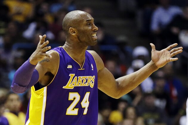 Los Angeles Lakers' Kobe Bryant argues a call against the Milwaukee Bucks during the second half of an NBA basketball game, Thursday, March 28, 2013, in Milwaukee. The Bucks won 113-103.(AP Photo/Jeffrey Phelps)