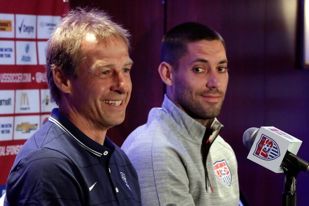 U.S. men's soccer coach Jurgen Klinsmann, left, and World Cup team captain Clint Dempsey answer questions during a news conference, in New York, Friday, May 30, 2014. The U.S. World Cup team is holding a pep rally in Times Square leading to Sunday's exhibition against Turkey, the second of three warmup matches for the Americans before next month's tournament in Brazil. (AP Photo/Richard Drew)