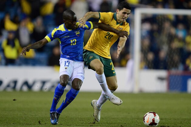 LONDON, ENGLAND - MARCH 05:  Tom Rogic of Australia battles with Enner Valencia of Ecuador during the International Friendly match between Australia and Ecuador at The Den on March 5, 2014 in London, England.  (Photo by Jamie McDonald/Getty Images)