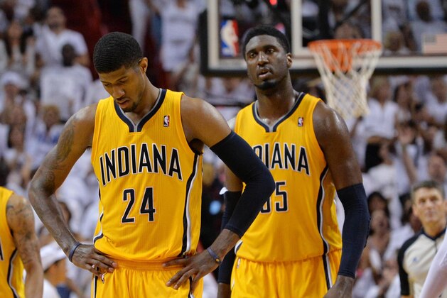 May 30, 2014; Miami, FL, USA; Indiana Pacers forward Paul George (24) and center Roy Hibbert (55) react during the second half in game six of the Eastern Conference Finals of the 2014 NBA Playoffs against the Miami Heat at American Airlines Arena. Mandatory Credit: Steve Mitchell-USA TODAY Sports