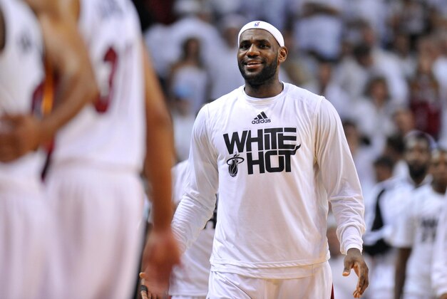 May 30, 2014; Miami, FL, USA; Miami Heat forward LeBron James celebrates with teammates against the Indiana Pacers during the second half in game six of the Eastern Conference Finals of the 2014 NBA Playoffs at American Airlines Arena. Mandatory Credit: Steve Mitchell-USA TODAY Sports