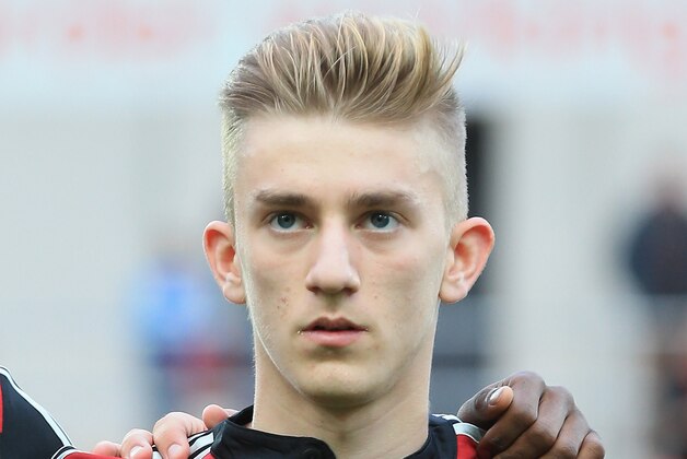 ROTHERHAM, ENGLAND - APRIL 16:  Sinan Kurt of Germany in actino during the  Under 18 International Friendly match between England U18 and Germany U18 at The New York Stadium on April 16, 2014 in Rotherham, England.  (Photo by Matthew Lewis/Getty Images)