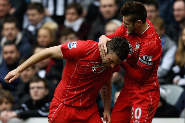 NEWCASTLE UPON TYNE, ENGLAND - FEBRUARY 24:  Rickie Lambert of Southampton celebrates his goal with Adam Lallana during the Barclays Premier League match between Newcastle United and Southampton at St James' Park on February 24, 2013 in Newcastle upon Tyne, England.  (Photo by Matthew Lewis/Getty Images)