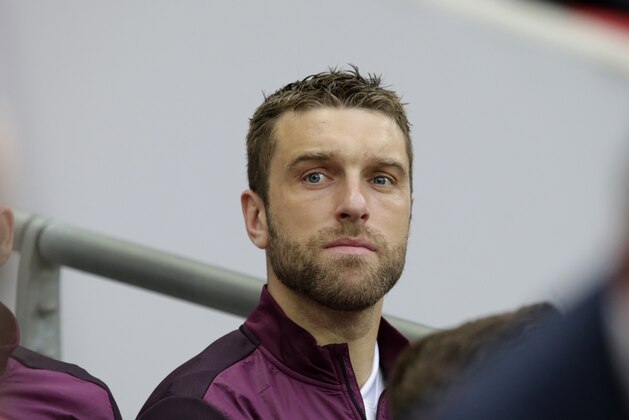 England's Rickie Lambert sits on the substitutes bench before the international friendly soccer match between England and Peru at Wembley Stadium in London, Friday, May 30, 2014.  (AP Photo/Matt Dunham)
