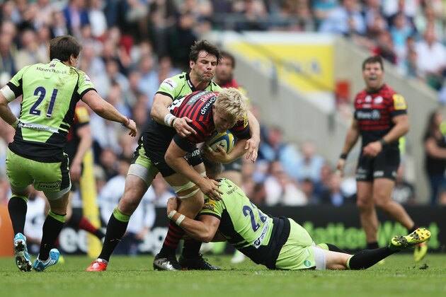 LONDON, ENGLAND - MAY 31:  Jackson Wray of Saracens is tackled by James Wilson of Northampton Saints during the Aviva Premiership Final between Saracens and Northampton Saints at Twickenham Stadium on May 31, 2014 in London, England.  (Photo by Mark Thompson/Getty Images)