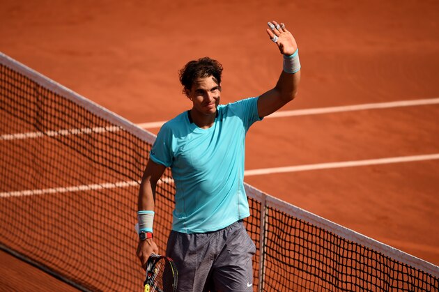 PARIS, FRANCE - MAY 31:  Rafael Nadal of Spain celebrates victory during his men's singles match against Leonardo Mayer of Argentina on day seven of the French Open at Roland Garros on May 31, 2014 in Paris, France.  (Photo by Matthias Hangst/Getty Images)