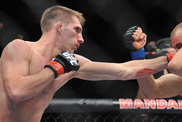 April 13, 2013; Las Vegas, NV, USA;  Luke Barnatt hits Collin Hart during the TUF 17 Finale at the Mandalay Bay Events Center. Mandatory Credit: Gary A. Vasquez-USA TODAY Sports