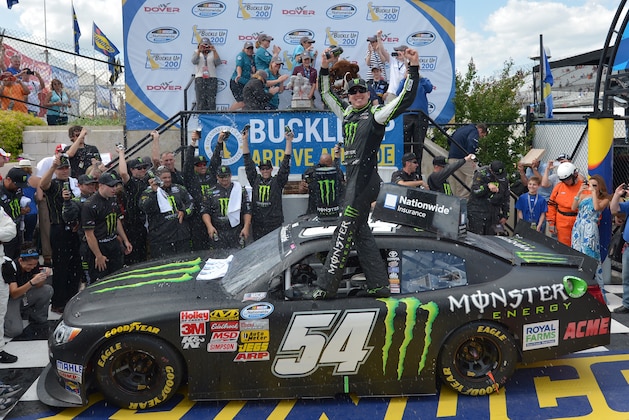 DOVER, DE - MAY 31:  Kyle Busch, driver of the #54 Monster Energy Toyota, celebrates in victory lane after winning during the NASCAR Nationwide Series Buckle Up 200 Presented By Click It Or Ticket at Dover International Speedway on May 31, 2014 in Dover, Delaware.  (Photo by Drew Hallowell/Getty Images)
