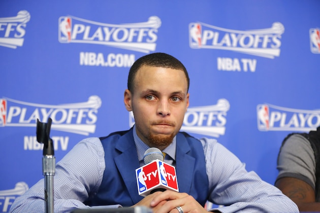 OAKLAND, CA - MAY 1: Stephen Curry #30 of the Golden State Warriors speaks to the media after defeating the Los Angeles Clippers in Game Six of the Western Conference Quarterfinals during the 2014 NBA Playoffs at Oracle Arena on May 1, 2014 in Oakland, California. NOTE TO USER: User expressly acknowledges and agrees that, by downloading and/or using this Photograph, user is consenting to the terms and conditions of Getty Images License Agreement. Mandatory Copyright Notice: Copyright 2014 NBAE (Photo by Rocky Widner/NBAE via Getty Images)