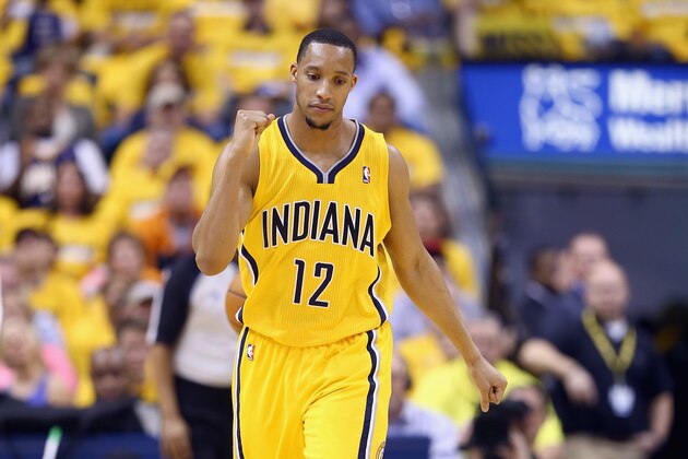 INDIANAPOLIS, IN - APRIL 19:  Evan Turner #12 of the the Indiana Pacers celebrates against the Atlanta Hawks in Game 1 of the Eastern Conference Quarterfinals during the 2014 NBA Playoffs at Bankers Life Fieldhouse on April 19, 2014 in Indianapolis, Indiana. NOTE TO USER: User expressly acknowledges and agrees that, by downloading and or using this photograph, User is consenting to the terms and conditions of the Getty Images License Agreement.  (Photo by Andy Lyons/Getty Images)