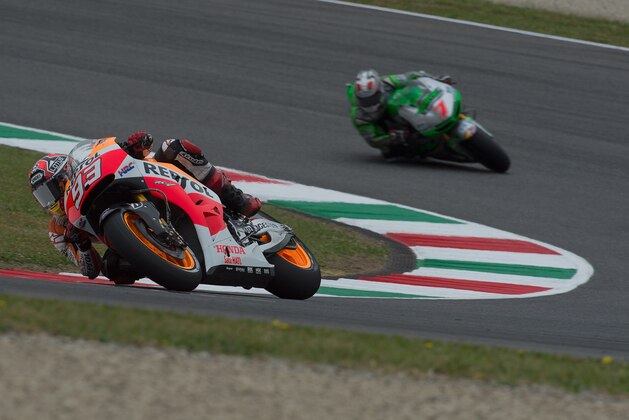 SCARPERIA, ITALY - MAY 30: Marc Marquez of Spain and Repsol Honda Team
rounds the bend during MotoGp of Italy - Free Practice at Mugello Circuit on May 30, 2014 in Scarperia, Italy. (Photo by Mirco Lazzari gp/Getty Images) SCARPERIA, ITALY - MAY 30: Marc Marquez of Spain and Repsol Honda Team
rounds the bend during MotoGp of Italy - Free Practice at Mugello Circuit on May 30, 2014 in Scarperia, Italy. (Photo by Mirco Lazzari gp/Getty Images)