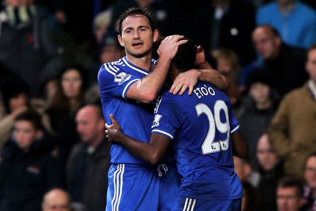 LONDON, ENGLAND - NOVEMBER 09:  Samuel Eto'o (R) of Chelsea is congratulated by teammate Frank Lampard after scoring the opening goal during the Barclays Premier League match between Chelsea and West Bromwich Albion at Stamford Bridge on November 9, 2013 in London, England.  (Photo by Ian Walton/Getty Images)