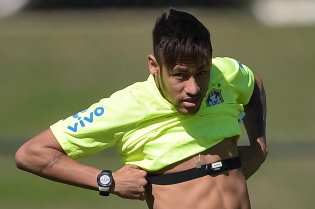 TERESOPOLIS, BRAZIL - MAY 31: Neymar in action during a training session of the Brazilian national football team at the squad's Granja Comary training complex, in Teresopolis, 90 km from downtown Rio de Janeiro on May 31, 2014 in Teresopolis, Brazil. (Photo by Buda Mendes/Getty Images)