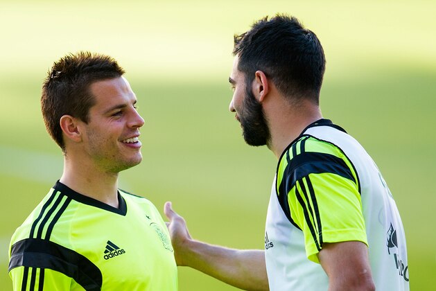 SEVILLE, SPAIN - MAY 29:  Cesar Azpilicueta (L) of Spain jokes with his teammate Raul Albiol during a training session ahead of their international friendly match against Bolivia at the Ramon Sanchez Pizjuan stadium on May 29, 2014 in Seville, Spain.  (Photo by David Ramos/Getty Images)