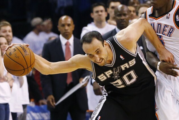 San Antonio Spurs guard Manu Ginobili (20) is fouled by Oklahoma City Thunder guard Reggie Jackson in the final minute of the second half of Game 6 of the Western Conference finals NBA basketball playoff series in Oklahoma City, Saturday, May 31, 2014. (AP Photo/Sue Ogrocki)