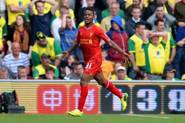 NORWICH, ENGLAND - APRIL 20:  Raheem Sterling of Liverpool celebrates scoring their third goal during the Barclays Premier League match between Norwich City and Liverpool at Carrow Road on April 20, 2014 in Norwich, England.  (Photo by Michael Regan/Getty Images)
