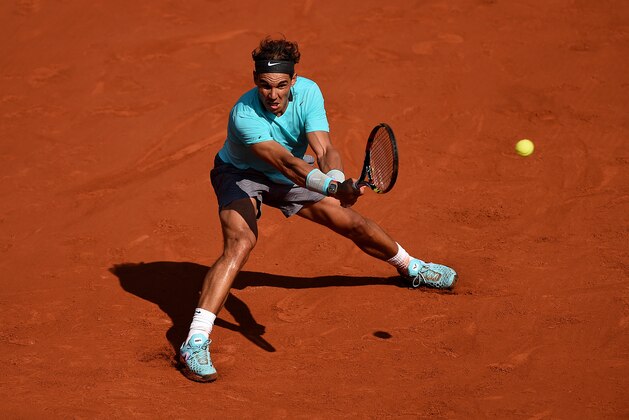 PARIS, FRANCE - MAY 31:  Rafael Nadal of Spain returns a shot during his men's singles match against Leonardo Mayer of Argentina on day seven of the French Open at Roland Garros on May 31, 2014 in Paris, France.  (Photo by Matthias Hangst/Getty Images)
