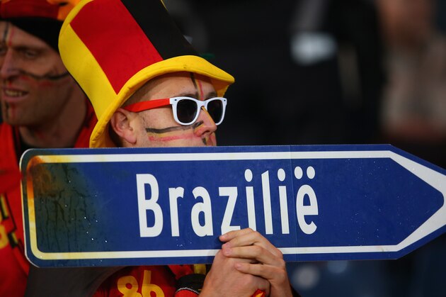 GLASGOW, SCOTLAND - SEPTEMBER 06:  A Belgium fan holds a sign up during the FIFA 2014 World Cup Qualifying Group A match between Scotland and Belgium at Hampden Park on September 6, 2013 in Glasgow, Scotland.  (Photo by Julian Finney/Getty Images)