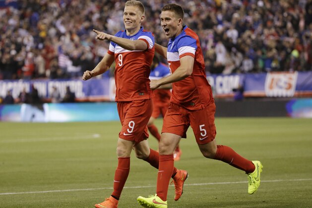 United States' Aron Johannsson (9) celebrates his goal with teammate Matt Besler, right, during the second half of an international friendly soccer match against Azerbaijan on Tuesday, May 27, 2014, in San Francisco. United States won 2-0. (AP Photo/Marcio Jose Sanchez)