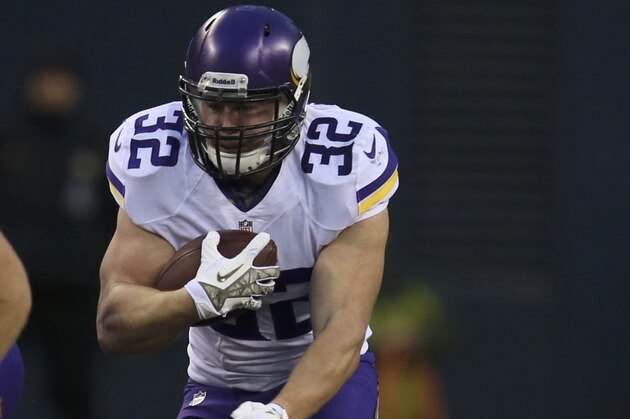 Toby Gerhart (32) of the Minnesota Vikings in action during the fourth quarter of an NFL game against the Seattle Seahawks at Century Link Field in Seattle on Sunday, Nov. 17, 2013. (AP Photo/David Seelig)