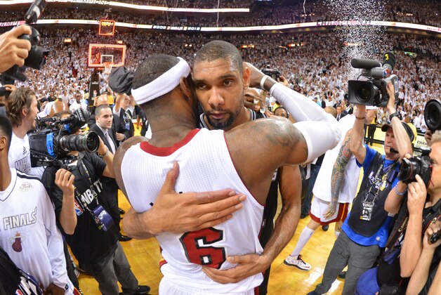 MIAMI, FL - JUNE 20: LeBron James #6 of the Miami Heat hugs Tim Duncan #2 of the San Antonio Spurs after Game Seven of the 2013 NBA Finals on June 20, 2013 at American Airlines Arena in Miami, Florida. NOTE TO USER: User expressly acknowledges and agrees that, by downloading and or using this photograph, User is consenting to the terms and conditions of the Getty Images License Agreement. Mandatory Copyright Notice: Copyright 2013 NBAE (Photo by Jesse D. Garrabrant/NBAE via Getty Images)