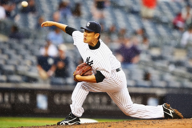 NEW YORK, NY - MAY 31:  Masahiro Tanaka #19 of the New York Yankees pitches against the Minnesota Twins in the fifth inning during their game at Yankee Stadium on May 31, 2014 in the Bronx borough of New York City.  (Photo by Al Bello/Getty Images)