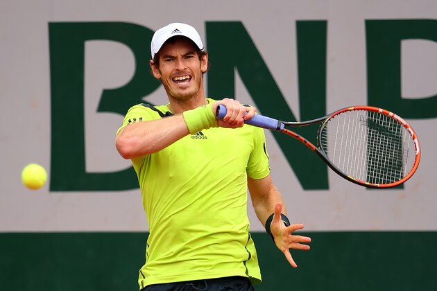 PARIS, FRANCE - JUNE 01:  Andy Murray of Great Britain returns a shot during his men's singles match against Philipp Kohlschreiber of Germany on day eight of the French Open at Roland Garros on June 1, 2014 in Paris, France.  (Photo by Clive Brunskill/Getty Images)