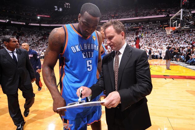 MIAMI, FL - JUNE 21:   Head Coach Scott Brooks of the Oklahoma City Thunder instructs Kendrick Perkins #5 of the Oklahoma City Thunder during Game Five of the 2012 NBA Finals between the Miami Heat and the Oklahoma City Thunder at American Airlines Arena on June 21, 2012 in Miami, Florida. NOTE TO USER: User expressly acknowledges and agrees that, by downloading and or using this Photograph, user is consenting to the terms and conditions of the Getty Images License Agreement. Mandatory Copyright Notice: Copyright 2012 NBAE (Photo by Andrew D. Bernstein/NBAE via Getty Images)