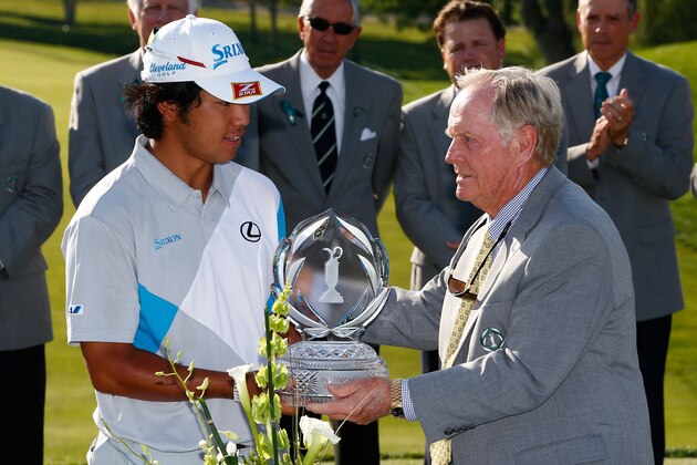 DUBLIN, OH - JUNE 01:  Hideki Matsuyama of Japan is presented the trophy by Jack Nicklaus after winning the Memorial Tournament presented by Nationwide Insurance at Muirfield Village Golf Club on June 1, 2014 in Dublin, Ohio.  (Photo by Andy Lyons/Getty Images)