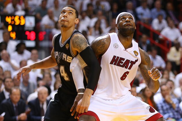 MIAMI, FL - JUNE 20:  LeBron James #6 of the Miami Heat boxes out Danny Green #4 of the San Antonio Spurs in the fourth quarter during Game Seven of the 2013 NBA Finals at AmericanAirlines Arena on June 20, 2013 in Miami, Florida. NOTE TO USER: User expressly acknowledges and agrees that, by downloading and or using this photograph, User is consenting to the terms and conditions of the Getty Images License Agreement.  (Photo by Mike Ehrmann/Getty Images)