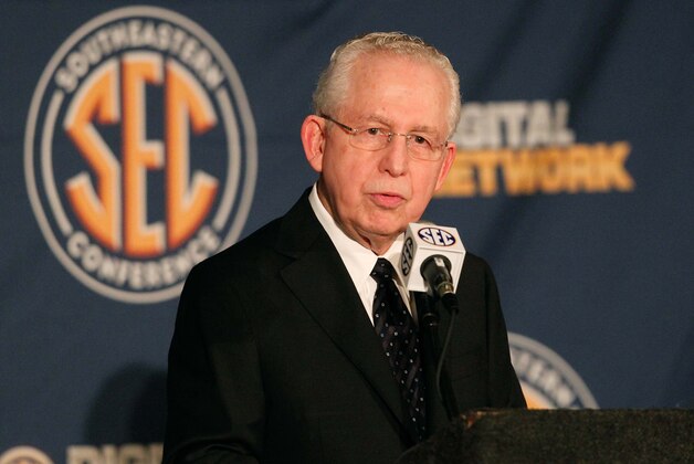 Jul 16, 2013; Hoover, AL, USA;  SEC commissioner Mike Slive talks with the media during the 2013 SEC football media days at the Hyatt Regency. Mandatory Credit: Marvin Gentry-USA TODAY Sports
