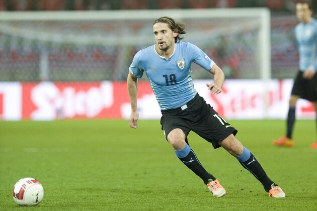 KLAGENFURT, AUSTRIA - MARCH 05:  Gaston Ramirez of Uruguay runs with the ball during the international friendly match between Austria and Uruguay at Woerthersee stadium on March 5, 2014 in Klagenfurt, Austria.  (Photo by Winnie Pessentheiner/Getty Images)