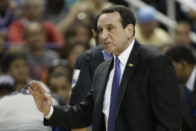 Duke head coach Mike Krzyzewski argues a call during the first half of an NCAA college basketball game against North Carolina State in the semifinals of the Atlantic Coast Conference tournament in Greensboro, N.C., Saturday, March 15, 2014. (AP Photo/Bob Leverone)