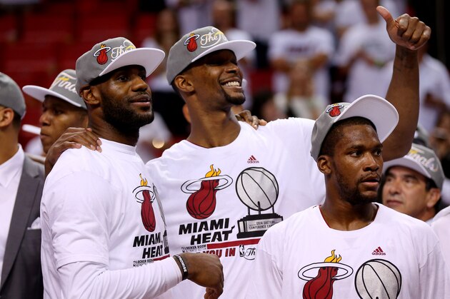 MIAMI, FL - MAY 30:  LeBron James #6 and Chris Bosh #1 and Toney Douglas #0 of the Miami Heat celebrate after defeating the Indiana Pacers in Game Six of the Eastern Conference Finals of the 2014 NBA Playoffs at American Airlines Arena on May 30, 2014 in Miami, Florida.  NOTE TO USER: User expressly acknowledges and agrees that, by downloading and or using this photograph, User is consenting to the terms and conditions of the Getty Images License Agreement.  (Photo by Mike Ehrmann/Getty Images)