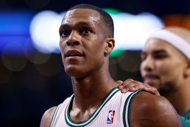 Mar 19, 2014; Boston, MA, USA; Boston Celtics point guard Rajon Rondo (9) celebrates after defeating the Miami Heat 101-96 at TD Garden.  Mandatory Credit: Greg M. Cooper-USA TODAY Sports
