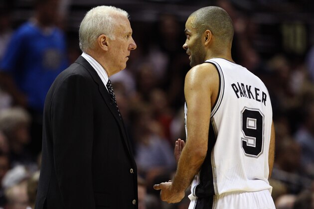 SAN ANTONIO, TX - MAY 29: Head coach Gregg Popovich of the San Antonio Spurs and Tony Parker #9 talk late in the game against the Oklahoma City Thunder during Game Five of the Western Conference Finals of the 2014 NBA Playoffs at AT&T Center on May 29, 2014 in San Antonio, Texas. NOTE TO USER: User expressly acknowledges and agrees that, by downloading and or using this photograph, User is consenting to the terms and conditions of the Getty Images License Agreement.  (Photo by Ronald Martinez/Getty Images)