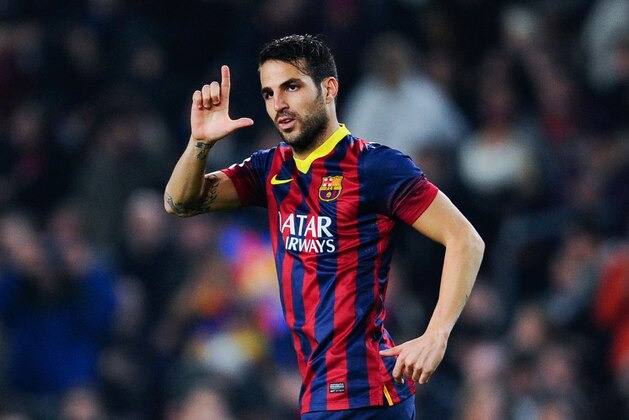 BARCELONA, SPAIN - JANUARY 08:  Cesc Fabregas of FC Barcelona celebrates after scoring the opening goal during the Copa del Rey round of 16 first leg match between FC Barcelona and Getafe CF at Camp Nou on January 8, 2014 in Barcelona, Spain.  (Photo by David Ramos/Getty Images)