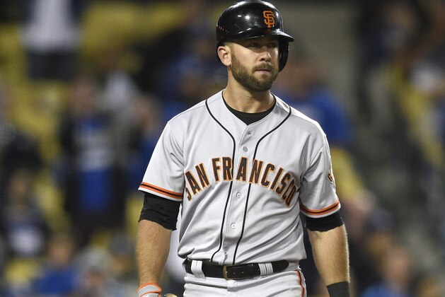 San Francisco Giants’ Brandon Hicks reacts after he strikes out during the ninth inning of a baseball game against the Los Angeles Dodgers in Los Angeles, Thursday, May 8, 2014. (AP Photo/Kelvin Kuo)