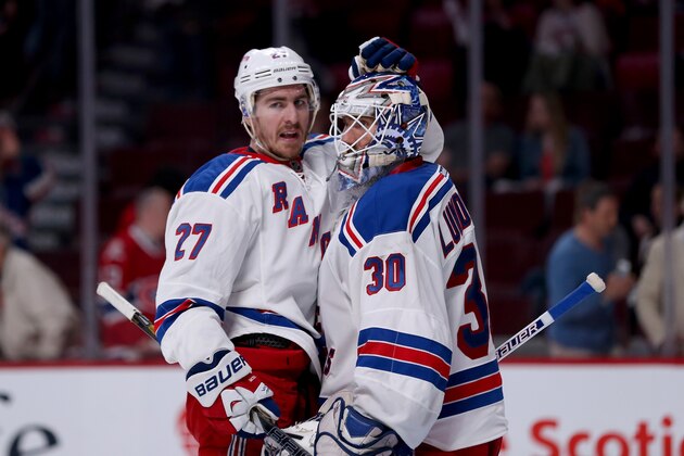 MONTREAL, QC - MAY 17:  Ryan McDonagh #27 and goaltender Henrik Lundqvist #30 of the New York Rangers celebrate the Rangers 7-2 victory against the Montreal Canadiens in Game One of the Eastern Conference Finals of the 2014 NHL Stanley Cup Playoffs at the Bell Centre on May 17, 2014 in Montreal, Canada.  (Photo by Bruce Bennett/Getty Images)