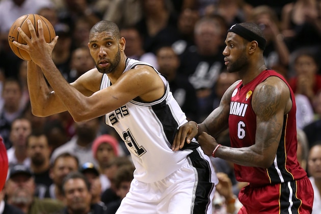 SAN ANTONIO, TX - JUNE 11:  Tim Duncan #21 of the San Antonio Spurs posts up LeBron James #6 of the Miami Heat in the second half during Game Three of the 2013 NBA Finals at the AT&T Center on June 11, 2013 in San Antonio, Texas. NOTE TO USER: User expressly acknowledges and agrees that, by downloading and or using this photograph, User is consenting to the terms and conditions of the Getty Images License Agreement.  (Photo by Mike Ehrmann/Getty Images)