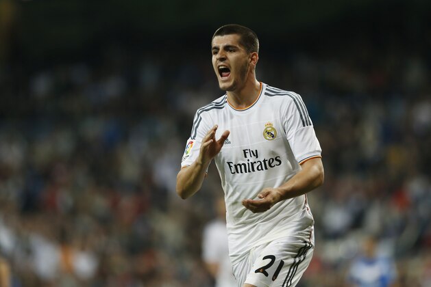 Real's Alvaro Morata celebrates his goal during a Spanish La Liga soccer match between Real Madrid and Almeria at the Santiago Bernabeu  stadium in Madrid, Spain, Saturday, April 12, 2014. (AP Photo/Andres Kudacki)