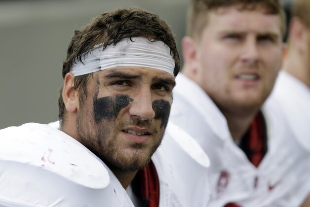 Stanford defensive end Ben Gardner (49) sits on the team bench during the first half of an NCAA college football game against Army on Saturday, Sept. 14, 2013, in West Point, N.Y. (AP Photo/Mike Groll)