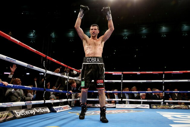 LONDON, ENGLAND - MAY 31:  Carl Froch celebrates after his victory over Geroge Groves during their IBF and WBA World Super Middleweight bout at Wembley Stadium on May 31, 2014 in London, England.  (Photo by Scott Heavey/Getty Images)