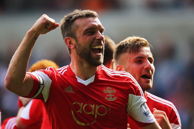 SWANSEA, WALES - MAY 03:  Rickie Lambert of Southampton celebrates with Luke Shaw (R) as he scores their first goal during the Barclays Premier League match between Swansea City and Southampton at Liberty Stadium on May 3, 2014 in Swansea, Wales.  (Photo by Clive Rose/Getty Images)