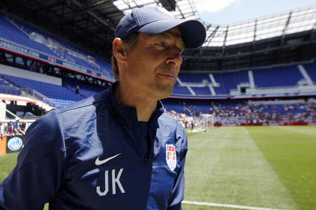 United States head coach Jurgen Klinsmann walks on the field during an open workout, Saturday, May 31, 2014, in Harrison, N.J. The United States are scheduled to Turkey in an international friendly soccer game on Sunday. (AP Photo/Julio Cortez)