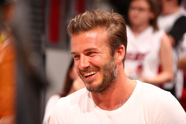 MIAMI, FL - MAY 6:  Former Soccer player David Beckham watches the Brooklyn Nets take on the Miami Heat in Game One of the Eastern Conference Semifinals of the 2014 NBA playoffs at American Airlines Arena in Miami, Florida on May 6, 2014.  NOTE TO USER: User expressly acknowledges and agrees that, by downloading and or using this photograph, User is consenting to the terms and conditions of the Getty Images License Agreement. Mandatory Copyright Notice: Copyright 2014 NBAE  (Photo by Nathaniel S. Butler/NBAE via Getty Images)