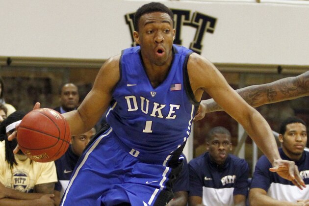 PITTSBURGH, PA - JANUARY 27:  Jabari Parker #1 of the Duke Blue Devils drives to the hoop against Michael Young #2 of the Pittsburgh Panthers at Petersen Events Center on January 27, 2014 in Pittsburgh, Pennsylvania.  (Photo by Justin K. Aller/Getty Images)