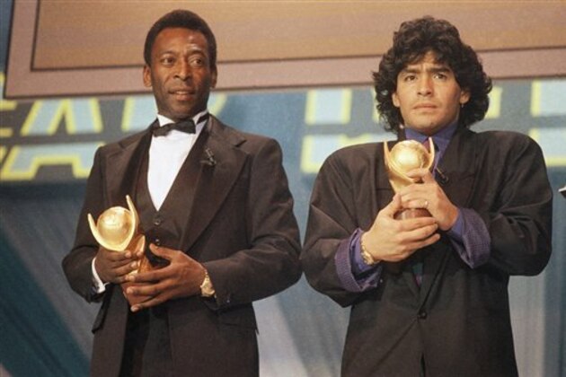 Pele and Maradona seen together in Italy in March 1987 as they received the trophy of “Sports Oscar” for their performance in the soccer fields. (AP Photo/Milan)