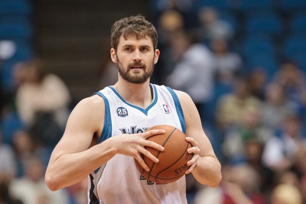 Apr 8, 2014; Minneapolis, MN, USA; Minnesota Timberwolves forward Kevin Love (42) grabs the ball pre game at Target Center. Mandatory Credit: Brad Rempel-USA TODAY Sports
